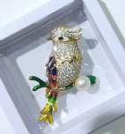 Brass bird brooch pin with pearl and enamel