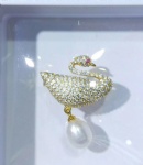 Brass bird brooch pin with pearl and clear cubic zircon